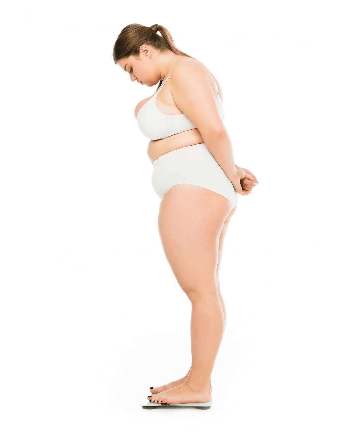 overweight woman on a scale