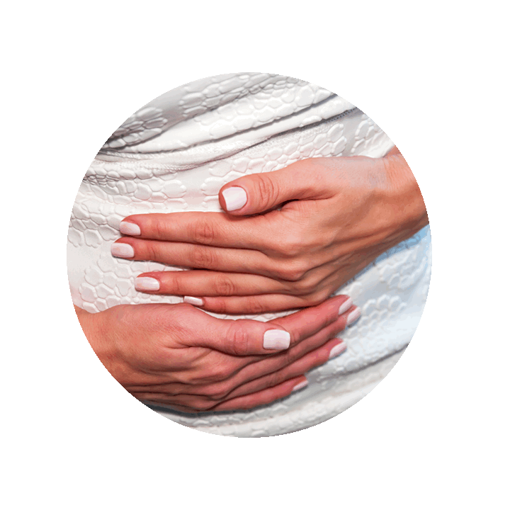 hands holding belly