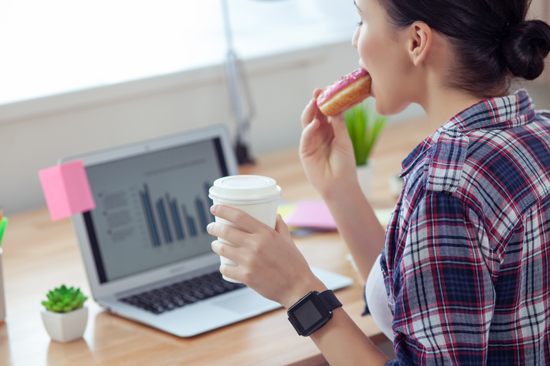 eating breakfast while working